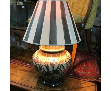 A pottery table lamp and two others (3) 