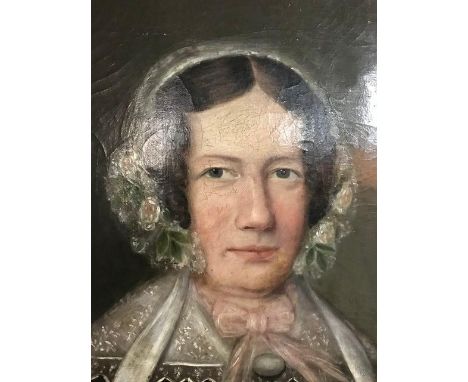 English school, 19th century, a bust portrait of a lady wearing a lace bonnet, oil on canvas, 61 x 49 cm 