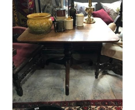 A Victorian oak tilt top tripod table, 97 cm wide 