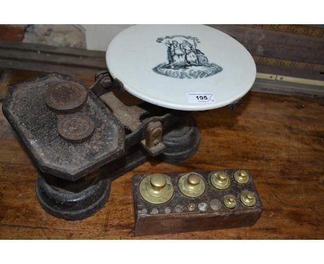 A set of scales, with weights 