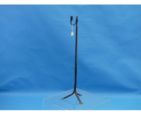 A Large Late 18thC wrought iron Rushlight Holder, with twisted stem supported on a tripod base.