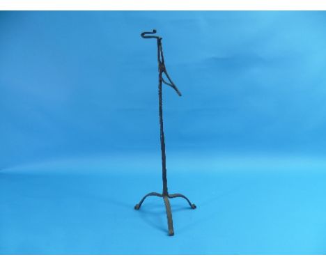 An 18thC wrought iron Rush Light Holder, on tripod base 26in (66cm) high.