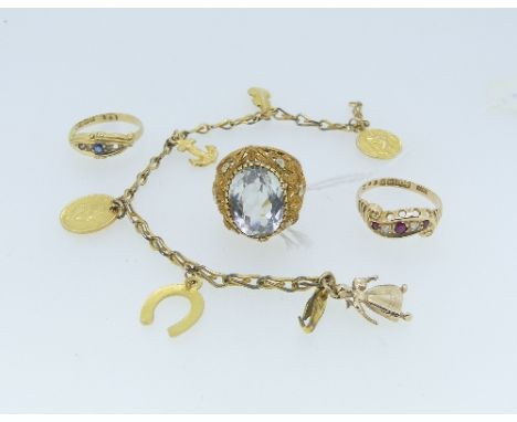 A small collection of Jewellery, including a rolled gold charm bracelet with five 9ct yellow gold charms attached, including 