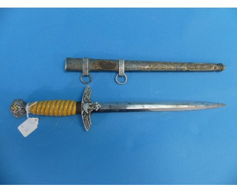 A WWII Nazi Luftwaffe 2nd Pattern Officer's Dagger, the pommel with gilted swastika and blade stamped SMF Solingen, together 