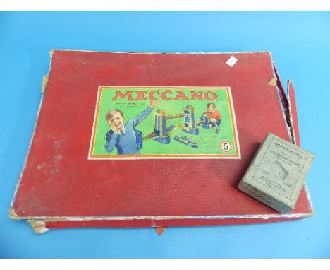 A Vintage Meccano Set No. 5, together with a Meccano motor quantity of loose Meccano (a lot)