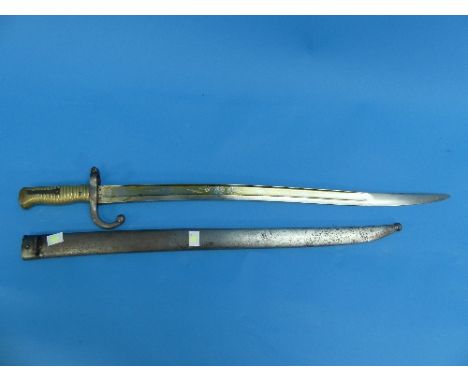 A French Model 1866 'Chassepot' Yataghan Sword Bayonet, the back edge with cursive engraving for the arsenal and dated 1869, 