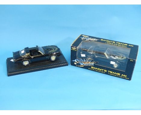 An American Muscle Ertl Collectibles 1:18 scale Smokey &amp; the Bandit General Motors Trans Am, in original box together wit