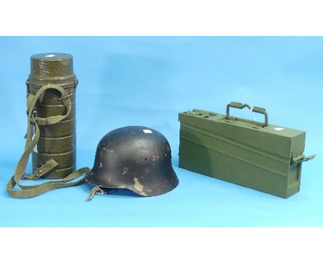 A Spanish Civivl War steel Helmet, together with 1950's German gas mask container and a Mauser MG 42 ammo box (3)