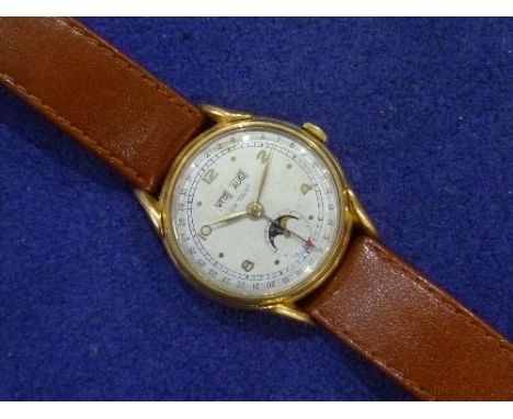 Cortebert: A gold-plated gentleman's date and moonphase Wristwatch, the circular silvered dial with alternate gold Arabic and
