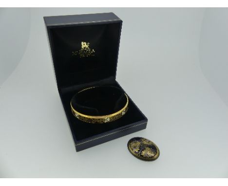 Michaela Frey Wien; A geometric design bangle, signed on the inside, together with a floral design brooch, marked on the pin 