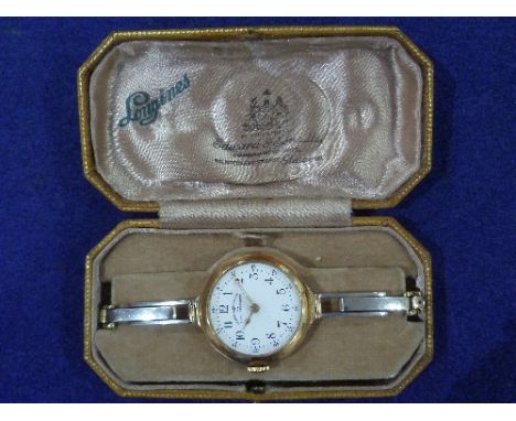 Omega: A 14K gold lady's Wristwatch, the circular white dial signed "Estrella Del Norte Levy Hermanos", with black Arabic num