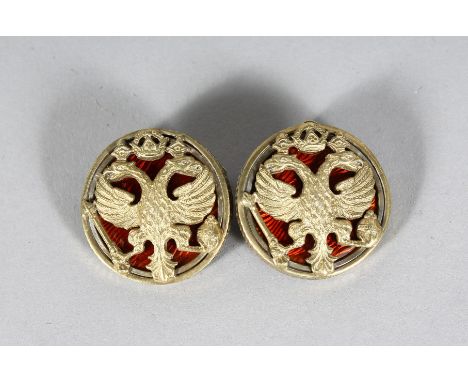 A PAIR OF RUSSIAN SILVER AND ENAMEL EAGLE CUFFLINKS. Stamped 88 and FABERGE MARK.  37gms.