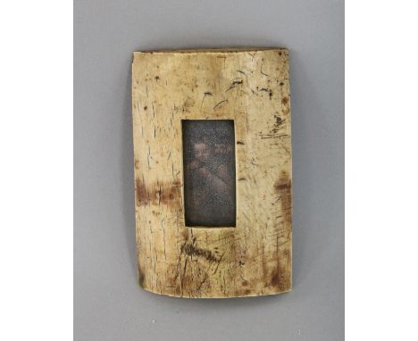 AN 18TH CENTURY DOMED BONE PICTURE FRAME with a portrait. 5ins x 3ins.