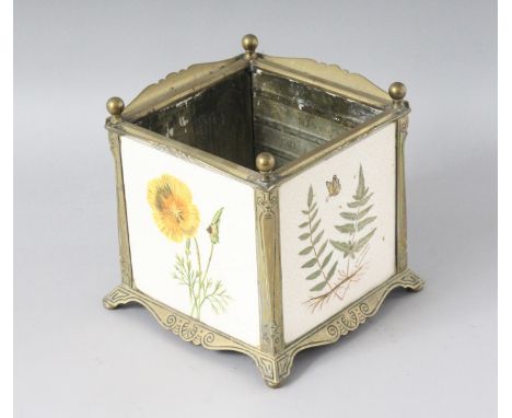 A MINTON TILE SQUARE JARDINIERE formed as four tiles with poppies, fern and butterflies, in a brass frame. 7.5ins high.