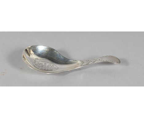 A GEORGE III BRIGHT CUT CADDY SPOON. London 1809.