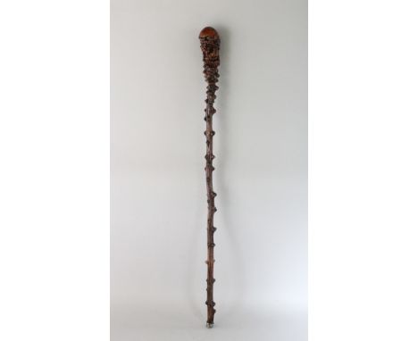 A ROOTWOOD WALKING STICK. 31ins long.