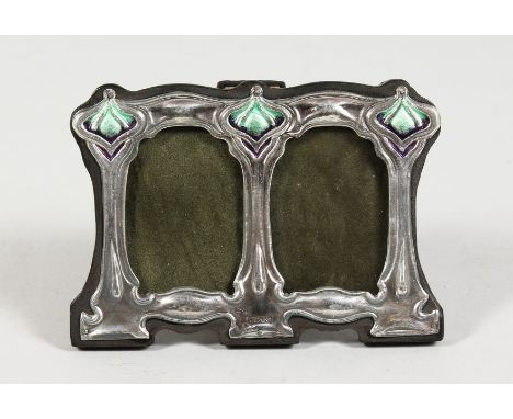 A SMALL ART NOUVEAU STYLE SILVER AND ENAMEL DOUBLE PHOTOGRAPH FRAME. 4.5ins x 3ins.