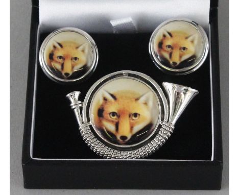 A SILVER AND ENAMEL FOX BROOCH and PAIR OF CUFFLINKS.