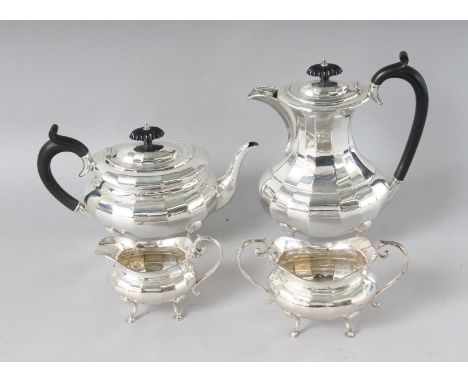 A FOUR PIECE SILVER TEA SET, comprising teapot, hot water jug, sugar basin and milk jug. Birmingham 1925-6.  Maker: Joseph Gl