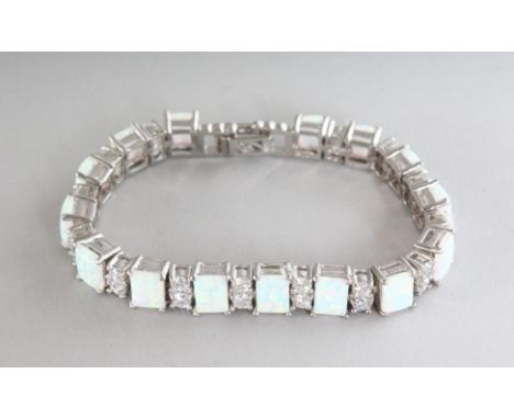 A GOOD SILVER, GILSON OPAL AND CZ LINE BRACELET.