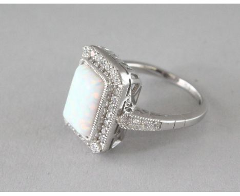 A SILVER, GILSON OPAL AND CZ RING.