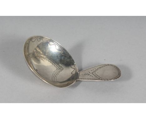 A GEORGE III CIRCULAR BOWL CADDY SPOON. London 1800.