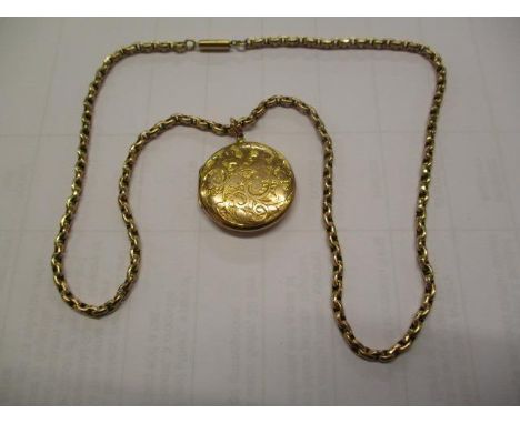 A 9ct gold necklace and a 9ct gold locket engraved with foliage, 15g total 