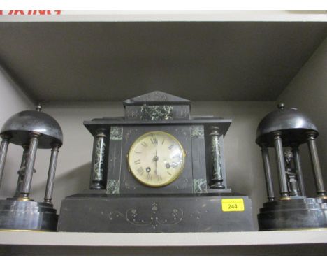 A Victorian black slate and marble mantle clock and two garnitures 