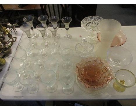 Table glassware to include a set of sixteen pedestal wine glasses, a dessert service, pedestal dishes and other items 