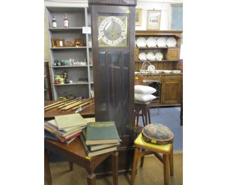 A Victorian circular mahogany footstool, a retro stool, a mahogany music sheet table and an oak longcase clock 