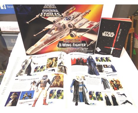 Kenner Star Wars X Wing Fighter electronic model, boxed, and a Star Wars Action Figure archive book and The Force Awakens boo