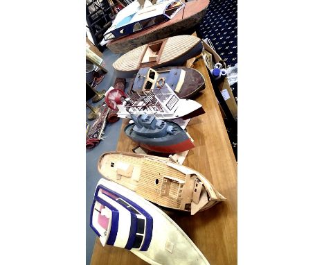 Selection of seven model boats mostly part built/require attention. Some fitted motors/servos/props etc. Not available for in