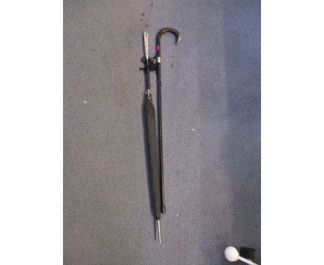 A silver coloured metal  handled umbrella and a silver capped walking stick