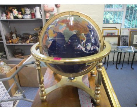 A large terrestrial globe on brass stand, 17 dia