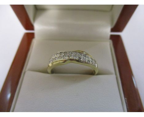 A 9ct gold half-eternity ring