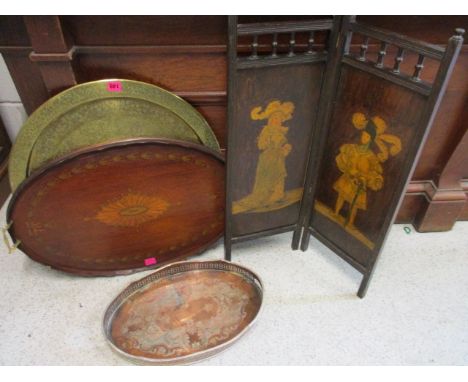 A large brass Eastern tray, an Edwardian mahogany inlaid and galleried tray, another galleried tray and an Edwardian mahogany