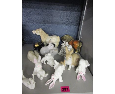 Four 20th century tumbling bunnies, animal ornaments to include three cheval, ceramic Shetland ponies and a small composition
