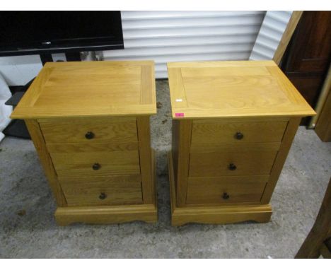A pair of modern light oak chest of , three drawers, 27 h, 20 1/2 w