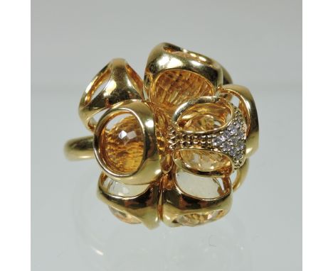 A large Di Modolo Triadra silver gilt, citrine and diamond articulated cluster ring, comprising nine sections, 3cm diameter, 