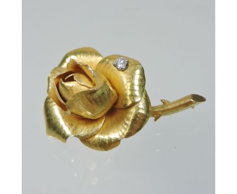 A French G R Lecomte unmarked brooch, in the form of a rose, set with a diamond, 4cm long, 10.4g gross. Georges Lecomte was a