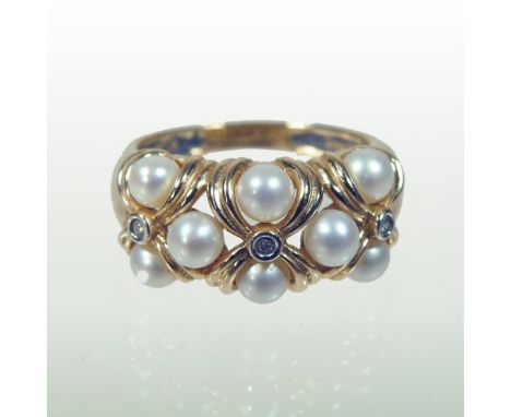 A 14 carat gold pearl and diamond cluster ring, of cross design, size N, 5.2g gross