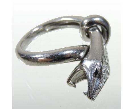 A Boucheron Kaa 18 carat gold and diamond set ring, in the form of a coiled hissing snake, with a diamond pave set head and b