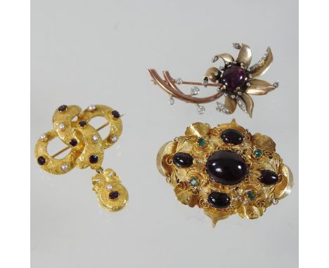 An unmarked two colour gilt, ruby and diamond brooch, in the form of a flower, 5cm overall, together with an unmarked memoria