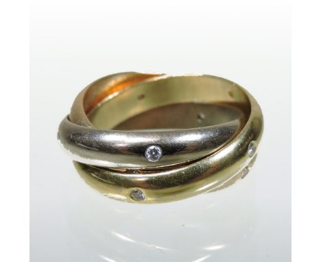A Cartier Trinity three colour 18 carat gold Russian wedding ring, composed of three interlocking rings, each set with five d