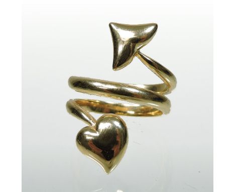 A Dior 18 carat gold ring, in the form of a heart and arrow, numbered B7271, size K, 9.4g gross