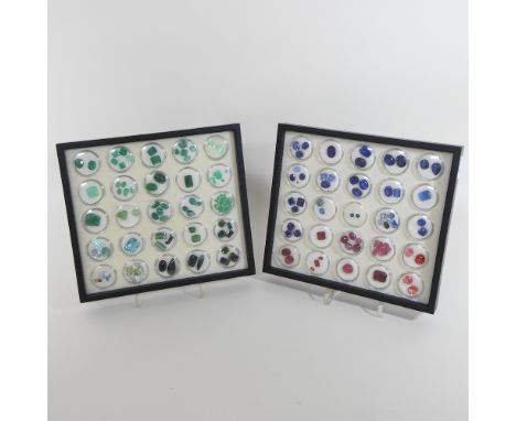 A collection of unmounted gemstones, to include jade and quartz, contained in fifty plastic 3cm containers, in two fitted tra