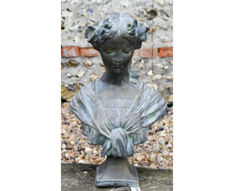A reconstituted cast stone Art Nouveau style bust of 'Josephine' in aged bronzed finish, 46 cm h