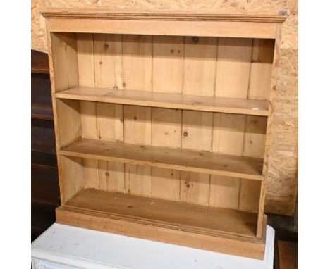 A pine open three shelf bookcase, 94 x 23 x 96 cm h