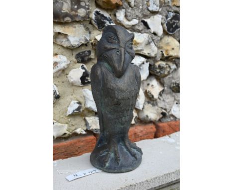 A reconstituted cast stone garden ornament of a grotesque 'Wally' bird in the manner of the Martin Brothers, 34 cm high