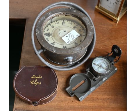 A brass Sestrel boat compass on gimbals 17 cm diam, to/w and a bearing compass (3)